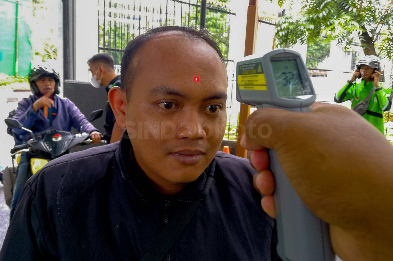 Pengecekan Suhu Tubuh...