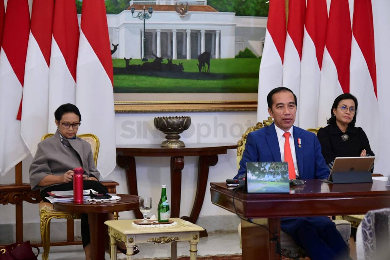 Presiden Jokowi Mengikuti...